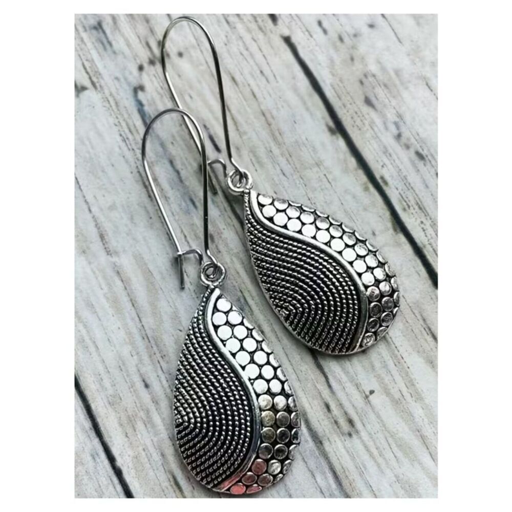 Silver Teardrop Dangle Earrings Featuring Intricate Dots & Swirl Textures Modern